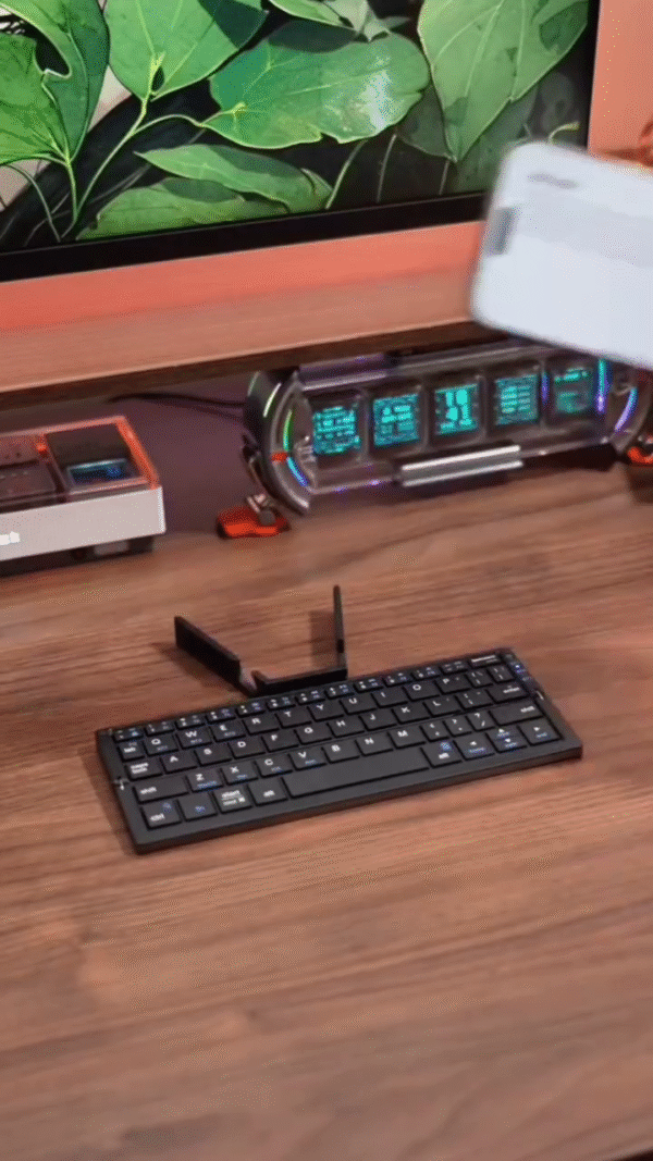Ultra-Compact Foldable Bluetooth Keyboard with Phone Stand