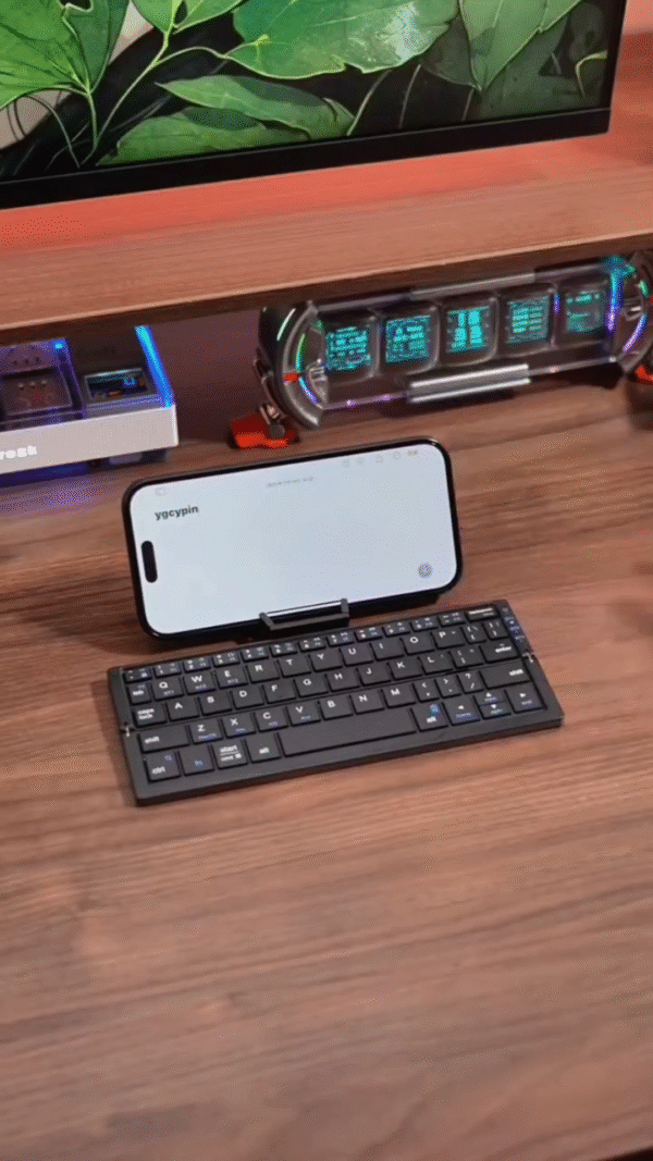 Ultra-Compact Foldable Bluetooth Keyboard with Phone Stand - Image 4