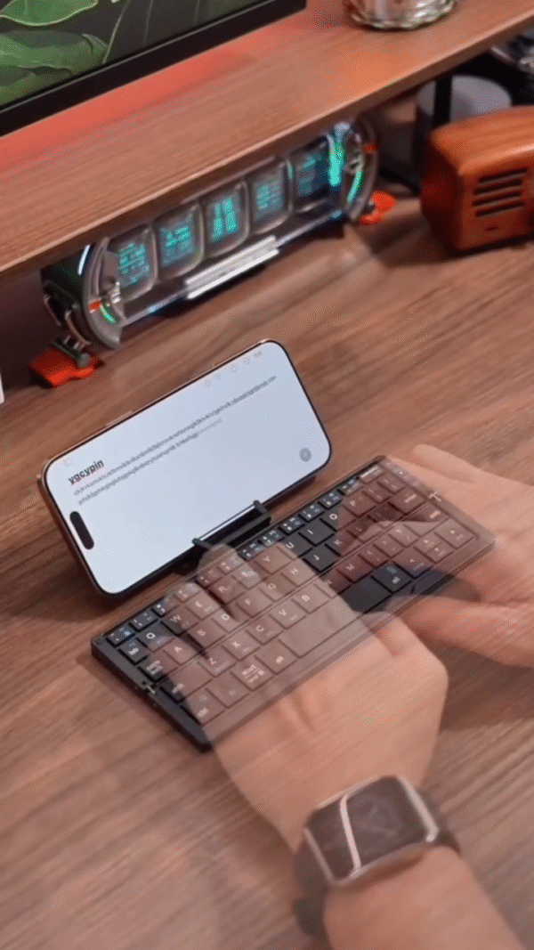 Ultra-Compact Foldable Bluetooth Keyboard with Phone Stand - Image 5