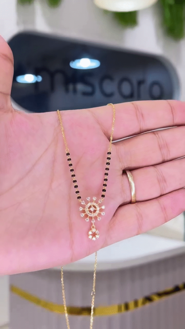 Traditional Gold-Toned Beaded Necklace with Sunburst Pendant